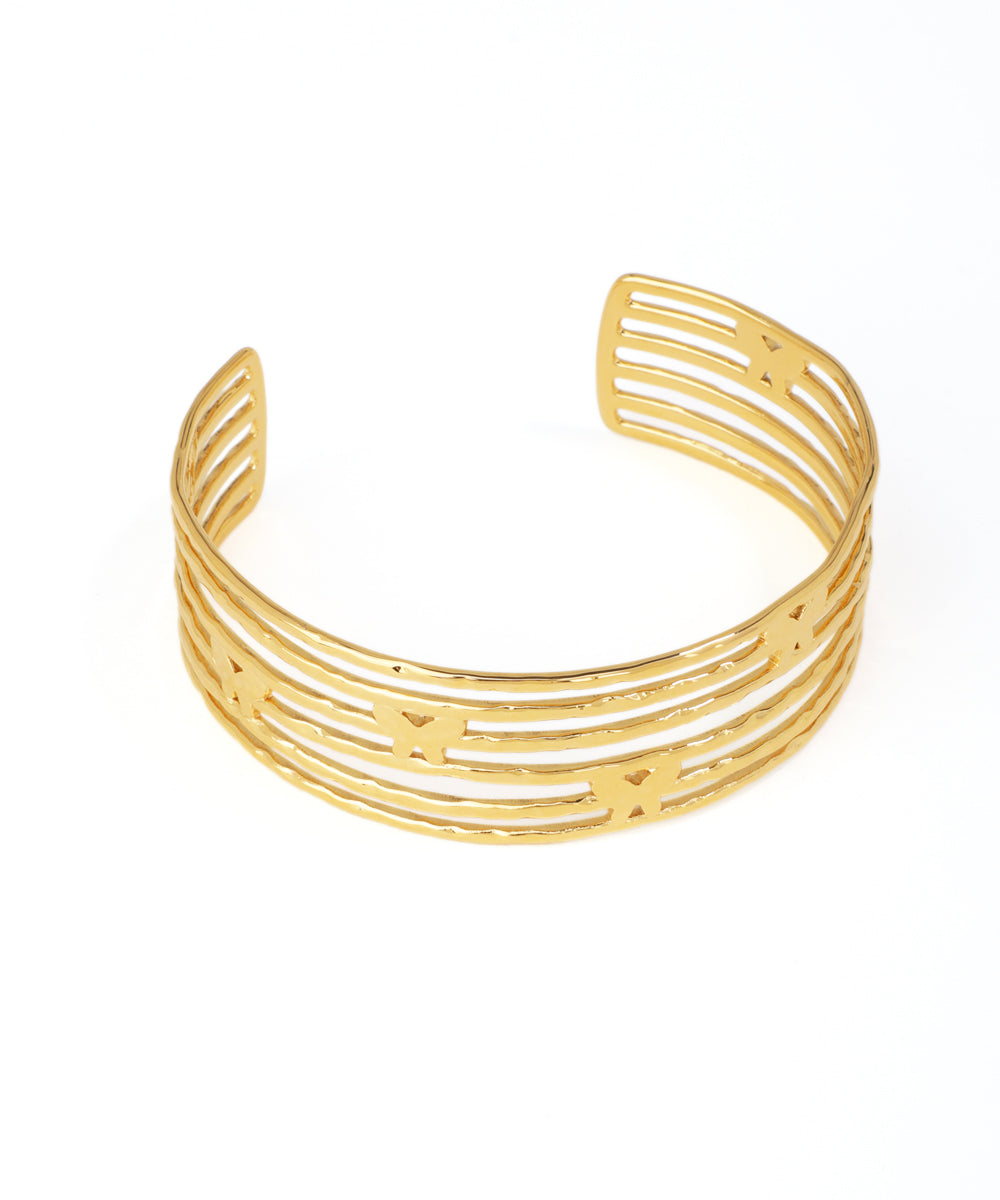 Gold bracelet with a white background