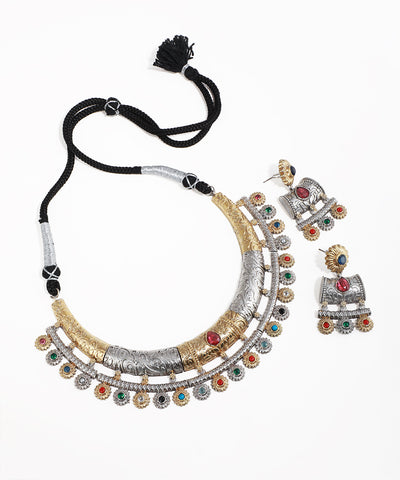 Jewelry set with necklace and earrings on a white background