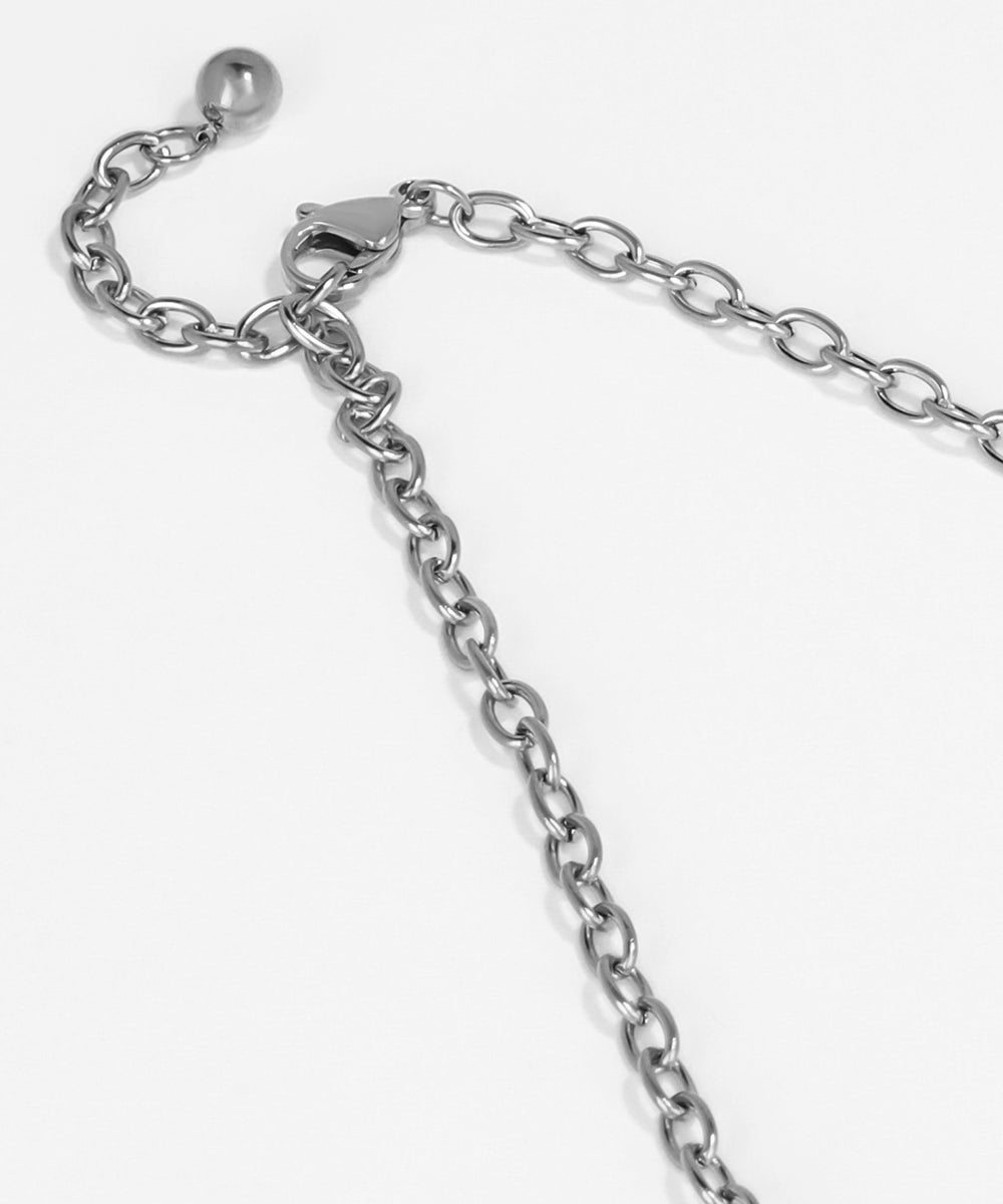 Silver chain bracelet on a white background