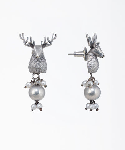 Oxidized silver-tone drop earrings with detailed deer head and clusters of small white faux pearls.
