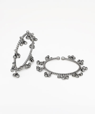 Pair of silver hoop earrings on a white background