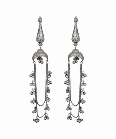 Pair of silver earrings with intricate designs on a white background