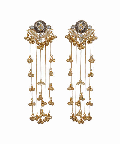 Pair of gold earrings with intricate designs on a white background