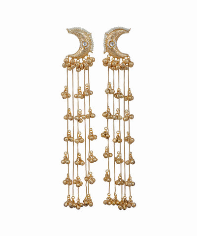 Pair of gold earrings with crescent moon designs on a white background