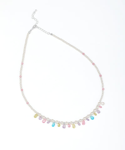 Rhodium finish beaded necklace with faux pearls, small pink beads, and colorful pastel teardrop glass crystals