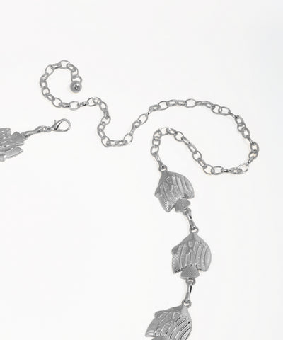 Silver bracelet with leaf-shaped charms on a white background