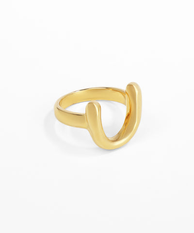 Gold ring on a white background