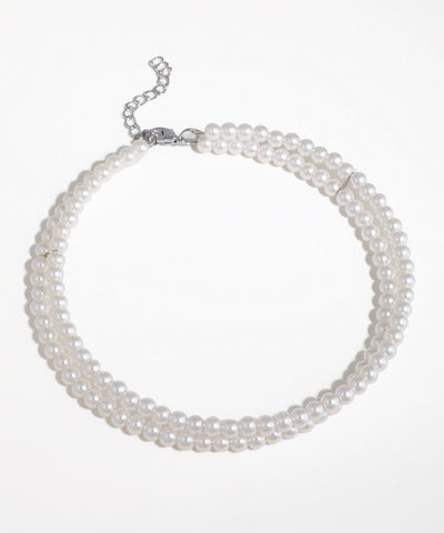 Rhodium finish double strand necklace with uniform white faux pearls and an extension chain