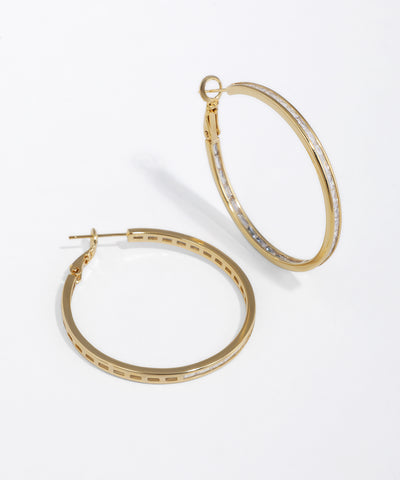 Gold-tone hoop earrings with clear baguette stone detail
