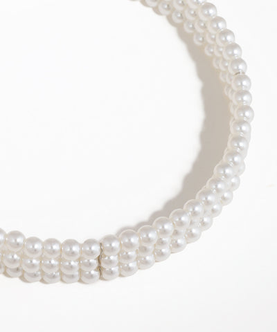 Pearl necklace on a white background