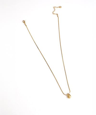 Gold necklace on a white background