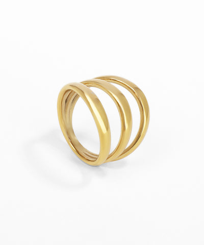 Gold ring with three intertwined bands on a white background