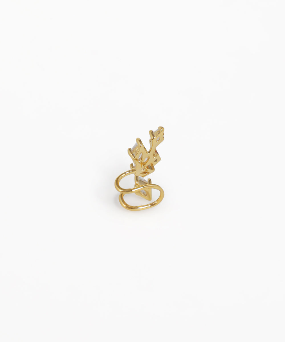 Gold ring with a small bird design on a white background