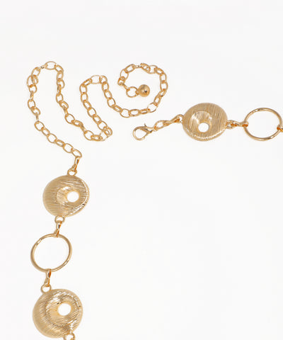 Gold necklace with circular pendants on a white background