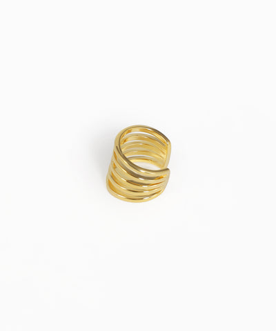 Gold spiral ring on a white background