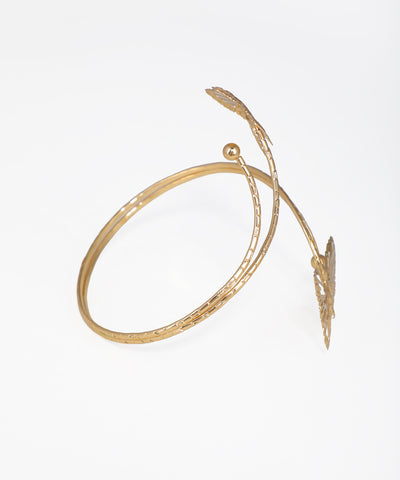 Gold bracelet on a white background