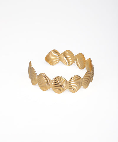 Gold-tone arm cuff with textured scallop wave design