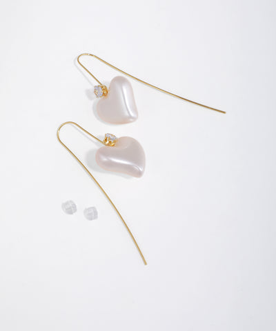 Gold-tone drop earrings with pearlescent puffed hearts and small clear stones