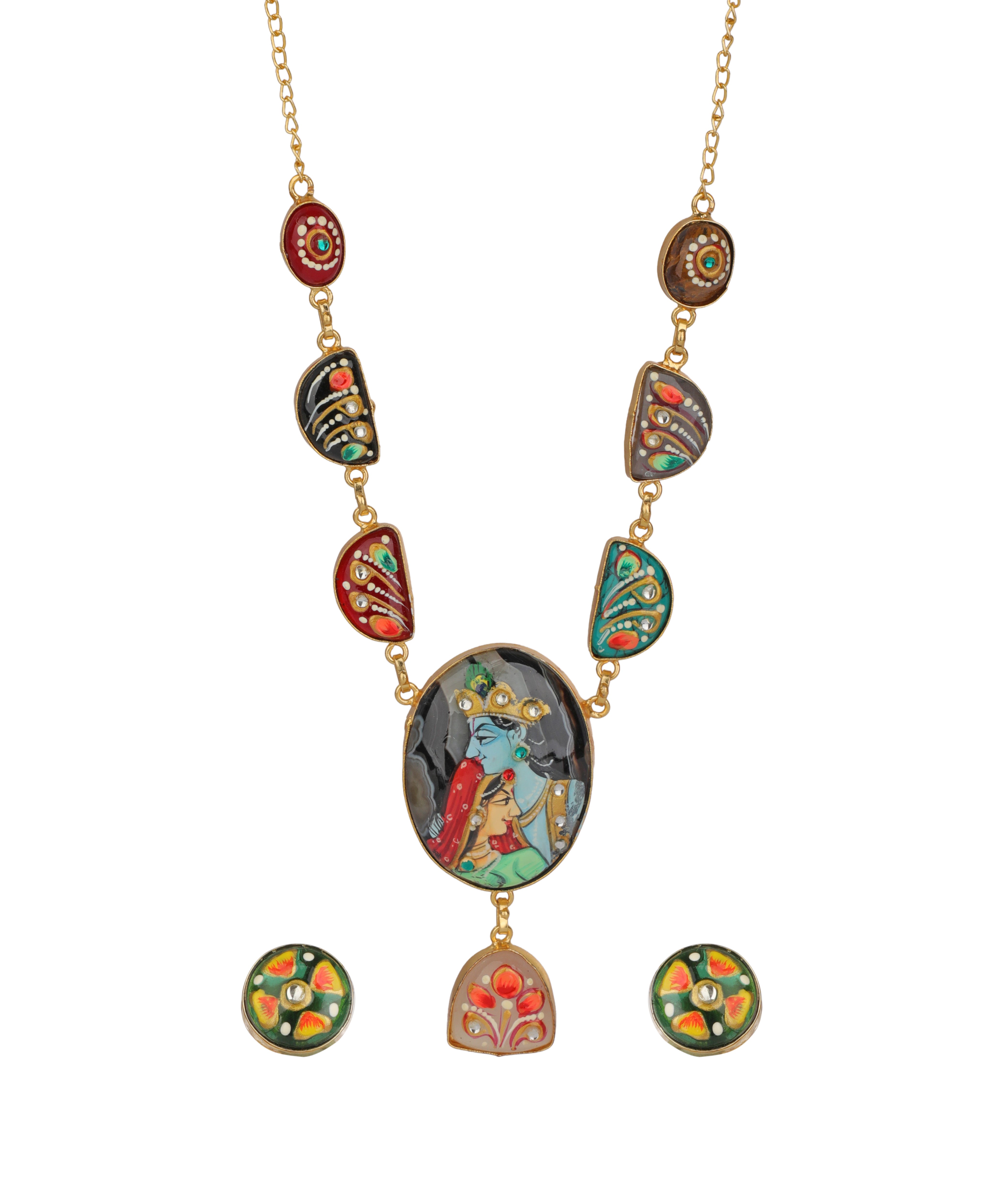 A gold-tone necklace with a central oval pendant depicting a blue-skinned figure, flanked by colorful enamel drop charms and matching oval stud earrings on a plain white background.