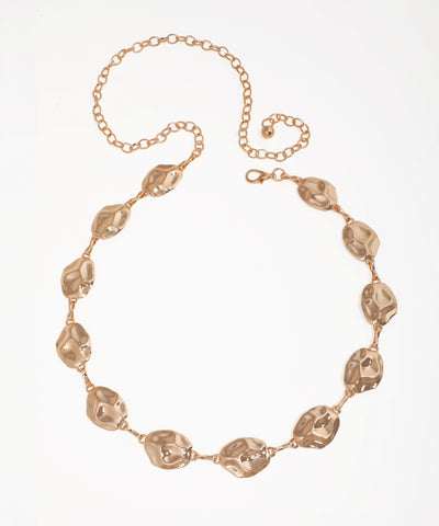 Rose gold necklace on a white background
