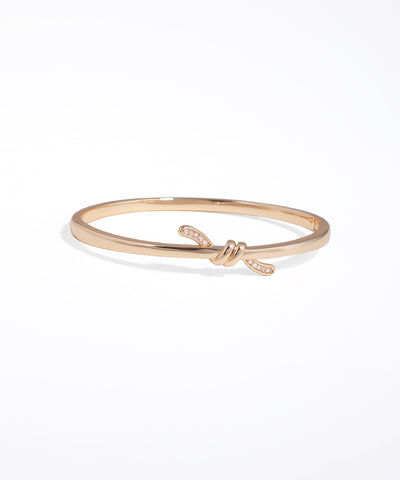 Rose gold bracelet on a white background
