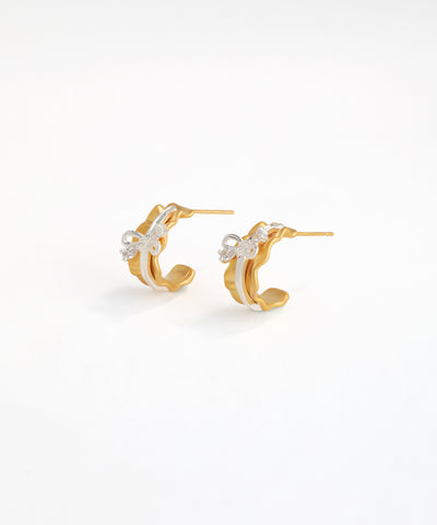 Artistic Mixed-Metal Bow Huggies – Modern Two-Tone Hoop Earrings