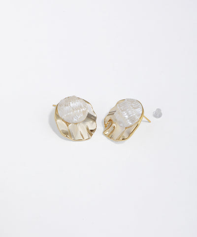 Gold-tone stud earrings with wavy metal base and textured, translucent dome