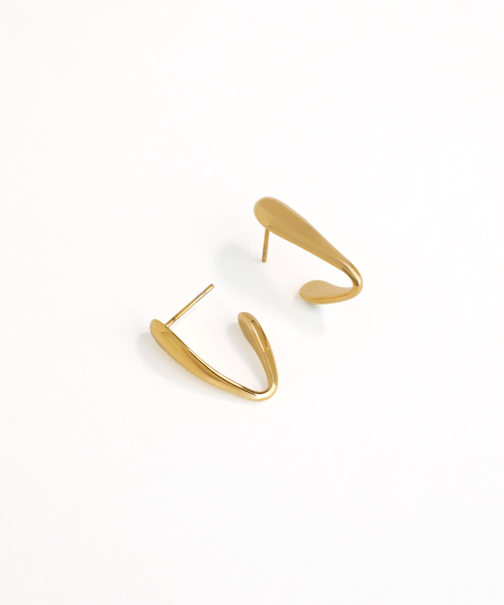 Pair of gold hoop earrings on a white background