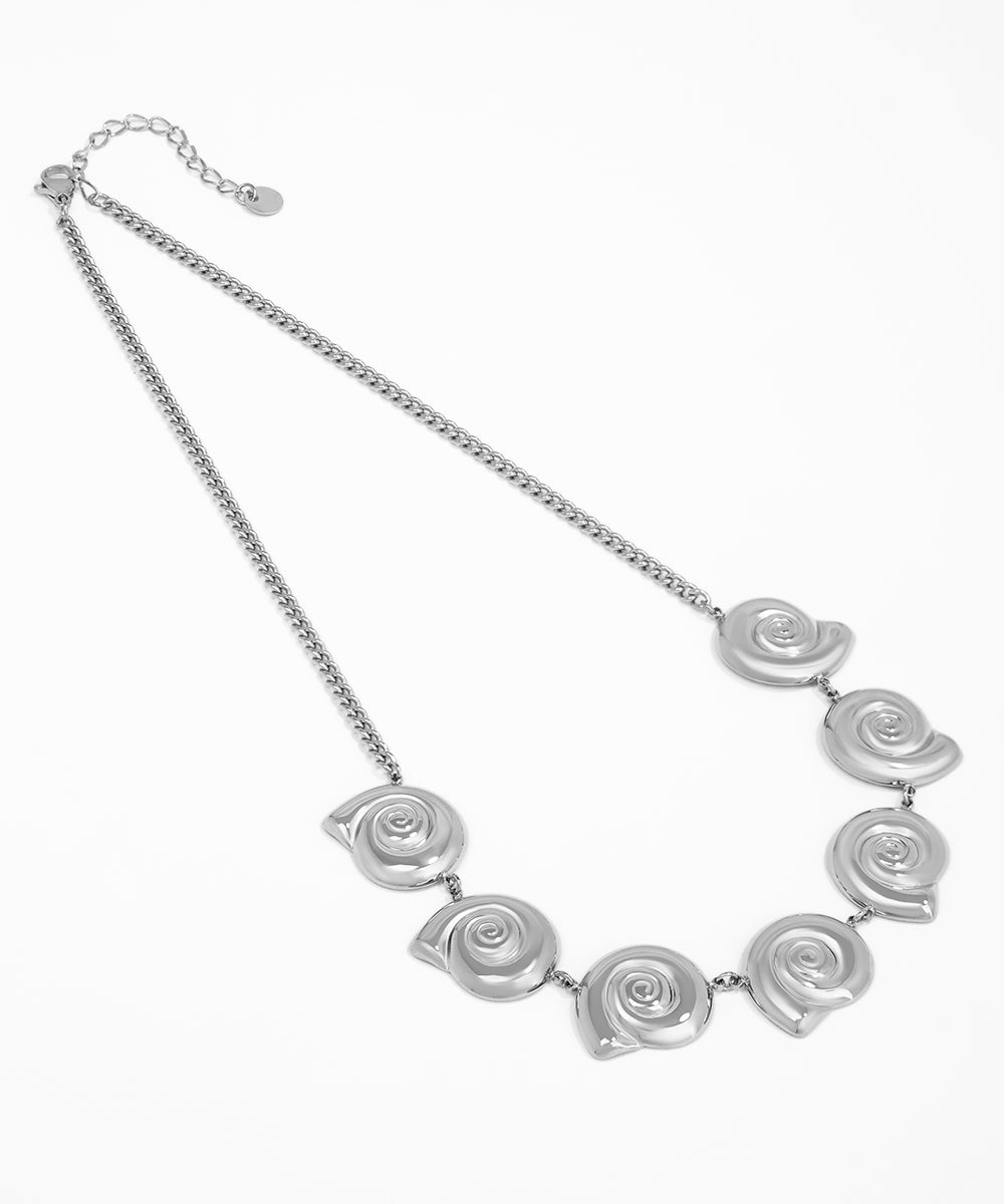 Silver necklace with rose-shaped pendants on a white background