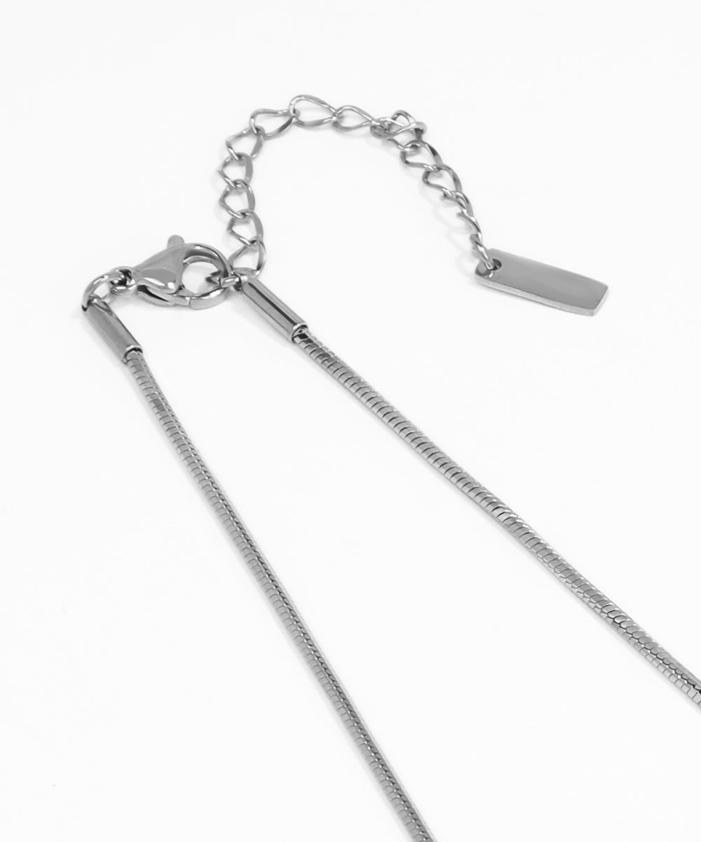 Silver chain necklace on a white background
