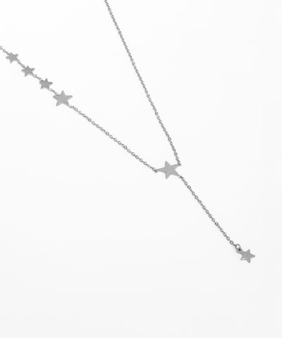 Silver star necklace on a white background