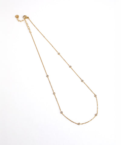 Gold necklace on a white background