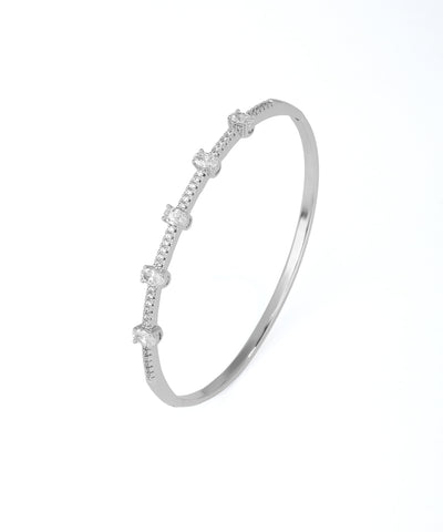 Silver bracelet with small diamonds on a white background