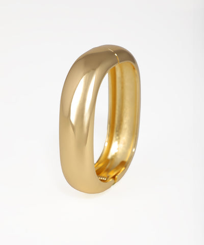 Gold ring on a white background
