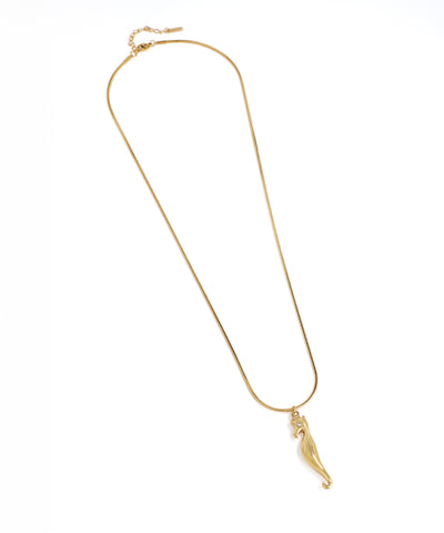 Gold necklace with a pendant on a white background