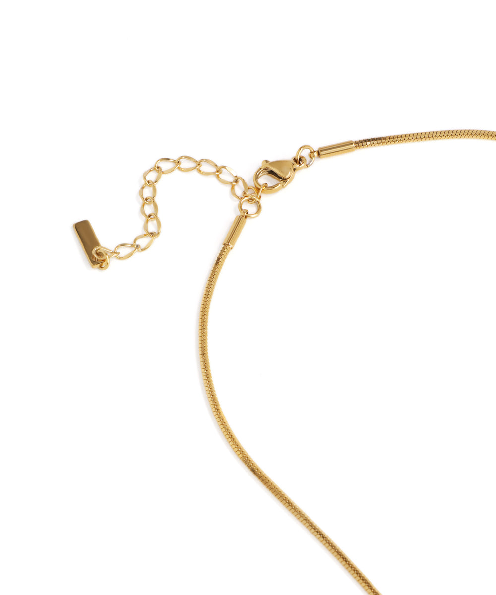 Gold bracelet on a white background