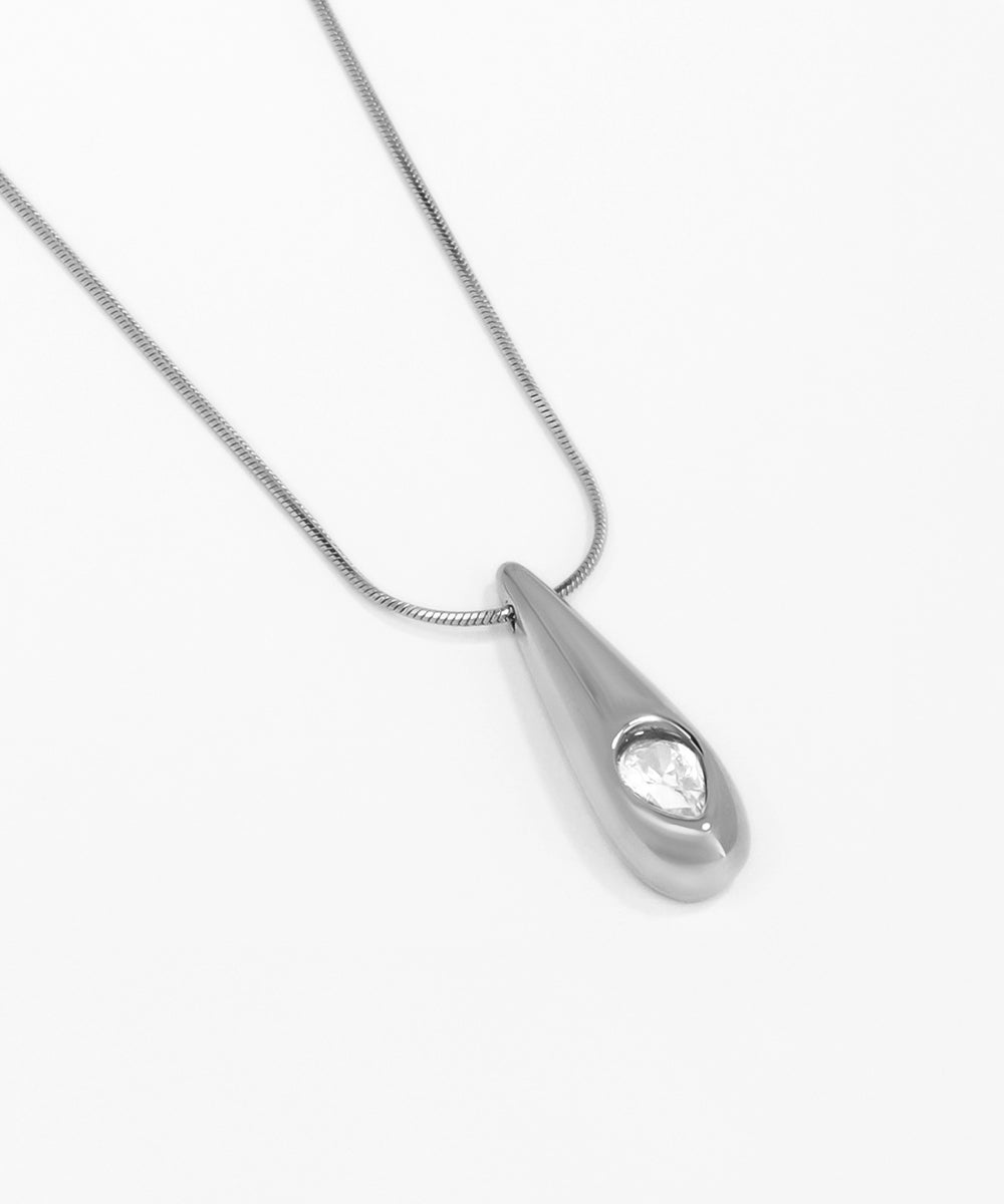 Silver teardrop pendant necklace on a white background