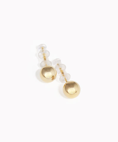 Gold-tone stud earrings with smooth spherical design