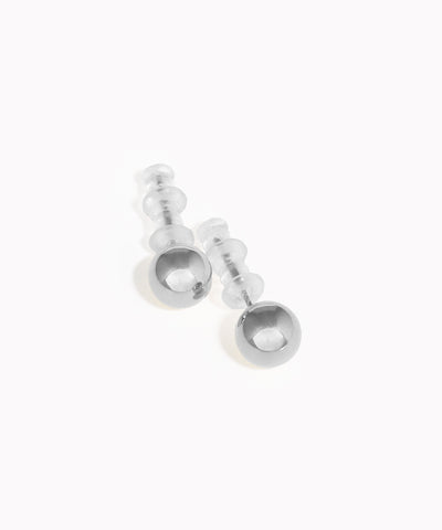 Pair of silver earrings on a white background
