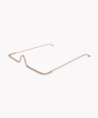 Rose gold cat-eye sunglasses frame on a white background