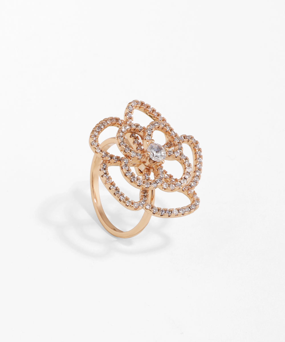 Rose gold ring with diamond accents on a white background