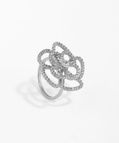 Silver ring with floral design on a white background