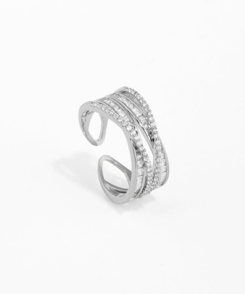 Silver ring with multiple bands on a white background