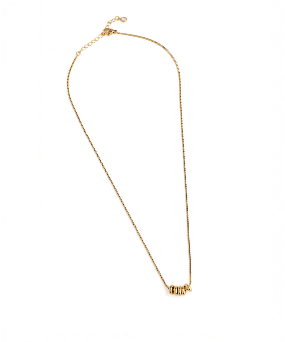 Gold necklace on a white background