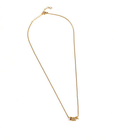 Gold necklace on a white background