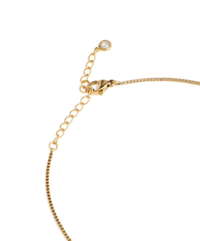 Gold necklace with a clasp on a white background