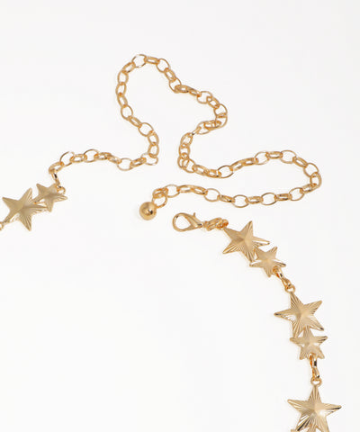 Gold necklace with star-shaped pendants on a white background