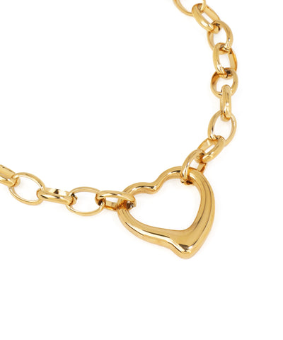 Gold chain bracelet with a heart-shaped clasp on a white background