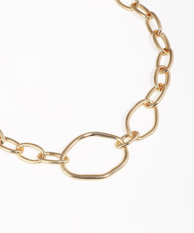 Gold chain necklace on a white background