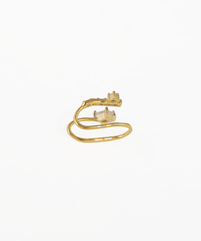 Gold ring with a diamond on a white background